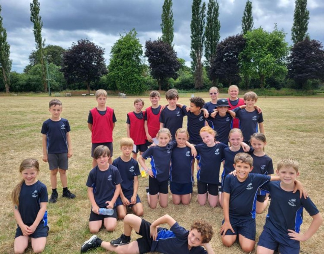 Photograph of the children who represented the district at the Area Athletics Championship.